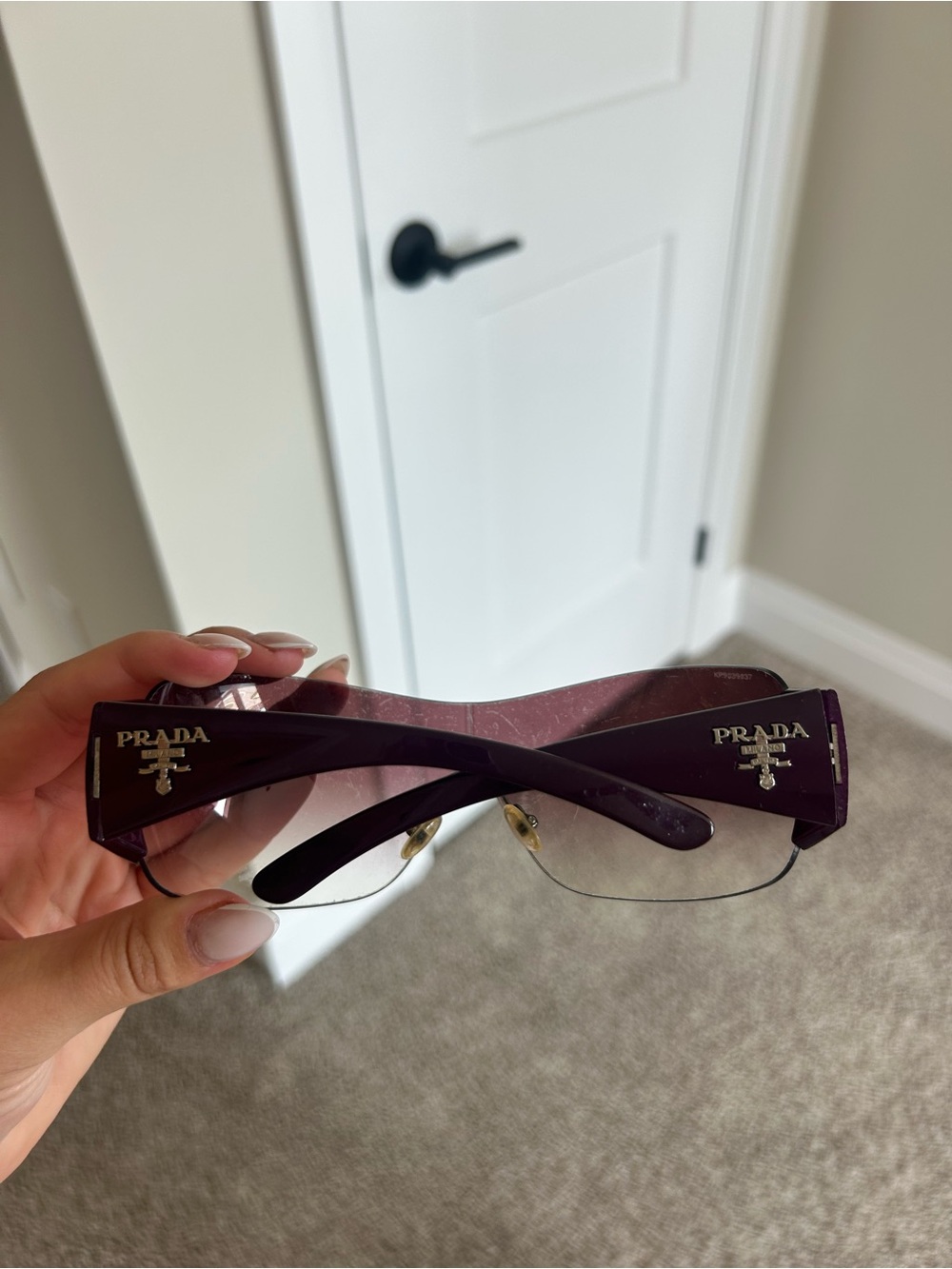 Prada Women's Rimless Sunglasses in Plum Purple